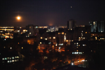 Defocused photograph of night city
