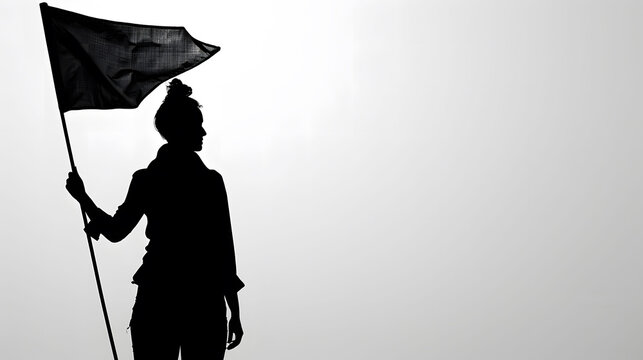 Black silhouette of a woman holding a  black flag, image captures a moment of assertive stance and expression, isolated on gray background