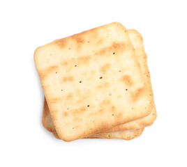 Tasty crispy square crackers isolated on white, top view