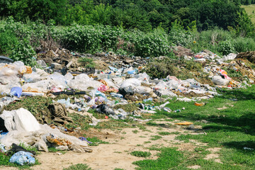 View of the landfill. Landfill A pile of plastic garbage, food waste and other garbage. Pollution...