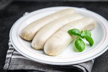 sausage meat weisswurst bavarian sausages second course fresh Cooking appetizer meal food snack on...