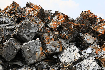 Bundle steel scrap , any home used white goods scraps compressed into cubes to increase the density. No trash or other non-metal materials are mixed.
