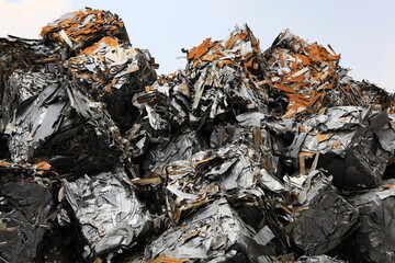 Bundle steel scrap , any home used white goods scraps compressed into cubes to increase the density. No trash or other non-metal materials are mixed.
