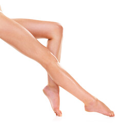 Legs, skin and beauty of feet in studio for shaving, cleaning or waxing for grooming isolated on a...