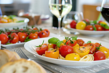Beautiful table setting with bruschetta pasta salad, with cherry tomatoes, fresh basil and spicy balsamic vinegar - 787234234