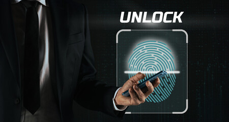 Businessman uses smartphone to authenticate online and login in a web application. Security concept