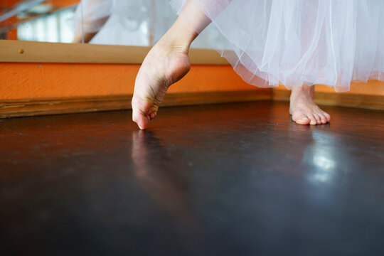 Close-up of ballerinas bare feet