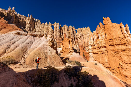 Woman taking pictures in Bryce Canyon National Park