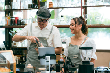 barista talking with customer about tasted of coffee cup with happy emotion at counter bar at cafe.coffee shop business owner concept,Service mind waiter