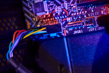 Vivid Ribbon Cable on High-Tech Motherboard - Macro View