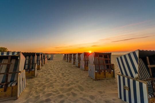 Strandkorb on the Polish Baltic Sea during the sunset