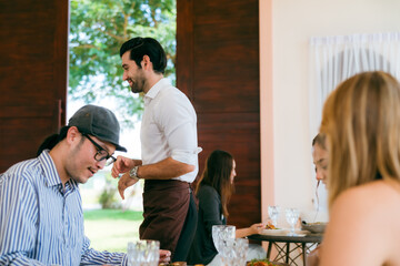 Enjoy Exceptional Service and Delicious Food at Our Eatery: Clients Savoring Meals and Drinks,...
