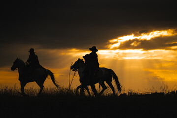cowboys and horses against the backdrop of breathtaking sunsets. Explore captivating silhouettes that embody the spirit of the Wild West and the beauty of nature