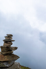 Stone Cairns in the Clouds (Austrian Alps)