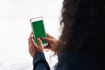 Businesswoman, hand and cellphone with green screen for mockup space on digital app, contact us or website. Person, fingers and smartphone at consulting firm or advice search, connection or corporate