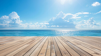 Wooden floor with beautiful blue sky and turquoise sea in background.