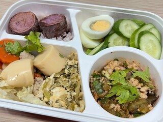 Tofu Soup Stir-fried pickled cabbage with egg, eggplant salad, boiled egg and cucumber with rice and purple potatoes