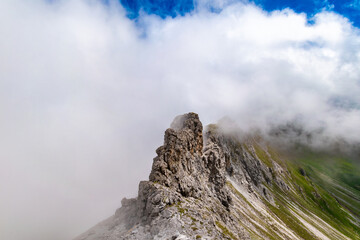 Clouds Over the Rugged Cliffs and Steep Slopes of Gamsluggen by Lünersee