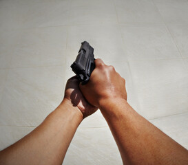 Hands, pov and man with gun against white background for target, practice or training on mockup....