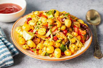 Selective focus of delicious Makhana chaat, made of roasted lotus seeds. 