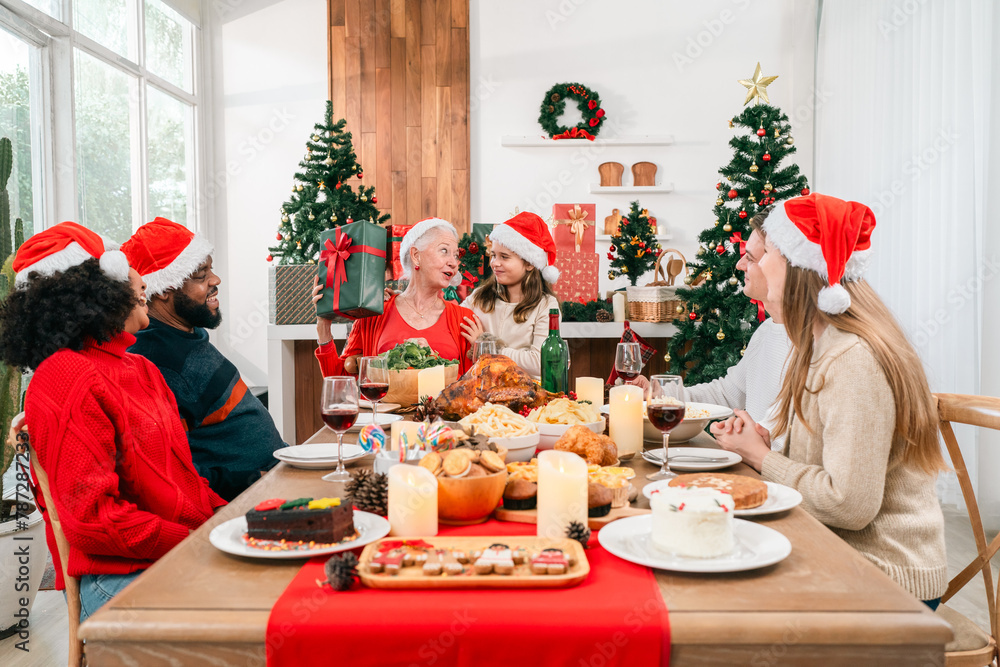 Sticker happy diverse family meeting each other at cozy home for celebrating christmas or new year. they hug