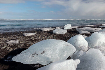 ice blocks on black diamond beach in Iceland 