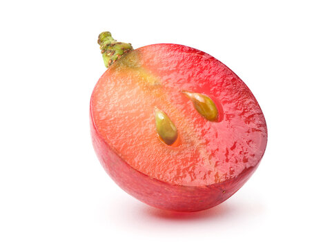 Juicy red grape cut in half isolated on white background. Clipping path.