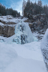 The beauty of Krimml Waterfalls during a snowy winter.