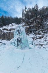 The beauty of Krimml Waterfalls during a snowy winter.
