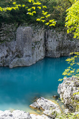 Kanal or Kanal ob Soč relaxing and small Slovenian village with a springboard to dive from the bridge. Small beach on the river with a view of the village from above. Slovenian landscapes. Nova Gorica