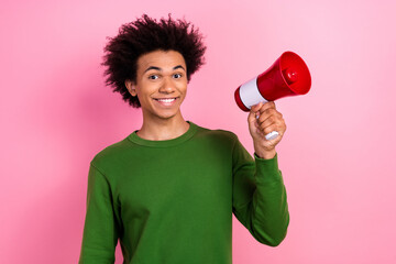 Photo of happy positive guy hold loud speaker microphone isolated pastel color background