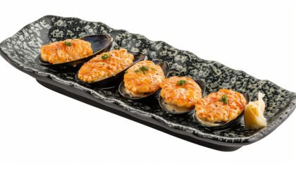 Exquisite traditional mediterranean grilled mussels elegantly served on a stylish black plate