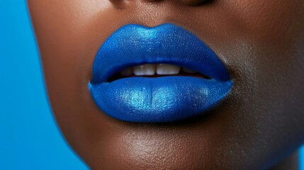 A bright electric blue lipstick pushing the boundaries and showcasing a fearless spirit. .