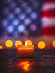 A single candle burns brightly against the backdrop of the American flag, a poignant Memorial Day tribute.