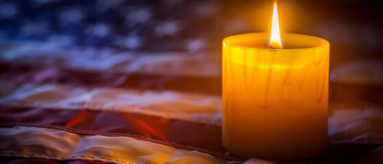 A warm, flickering flame illuminates an American flag-themed candle, evoking a sense of patriotism and reverence for fallen heroes on Memorial Day.