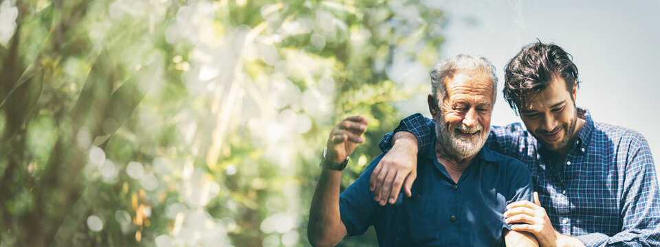 Celebrate Father's Day with Family: A Day of Joyful Bonding and Love, Fathers and Sons Sharing Hugs and Cheers at Home, Embracing Summer's Cheerful Spirit of Togetherness and Care