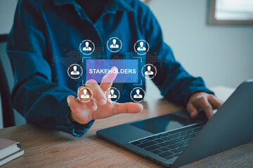 Stakeholders concept. Person touching stakeholders icon on virtual screen for business finance...