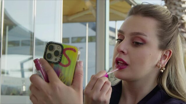 Young Woman and Make Up Lipstick