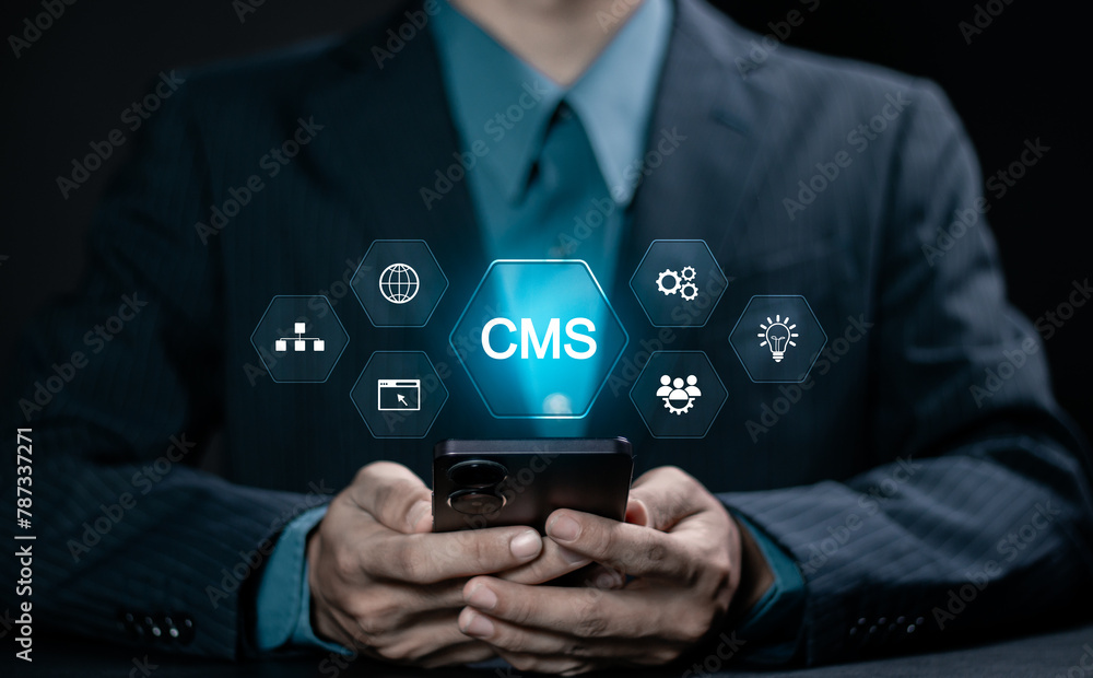 Aufkleber cms, content management system concept. businessman using smartphone with virtual screen of content 