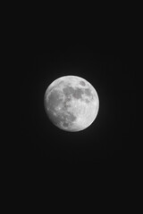 Obraz na płótnie Canvas Almost full moon with black background