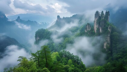 The magnificent and lush green mountain surrounded by clouds and mist, with unique rock formations above a beautiful and lush green valley