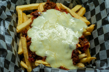 fries alone and with minced meat bolognese sauce mozzarella cheddar cheese and bacon 