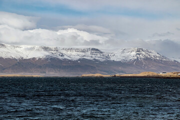 landscape with snowy mountain in Reykjavik town, Iceland