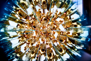 Golden Geometric Kaleidoscope Pattern with Ethereal Glow