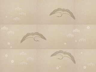 翼を広げた鶴　梅　松　茶色の和紙背景