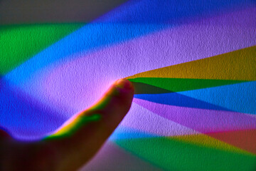 Human Touch in Rainbow Light Dispersion, Close-Up Perspective