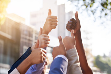 People, thumbs up and diversity with business success outdoor for agreement, teamwork and lens...