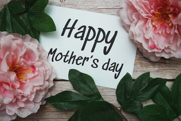 Happy Mothers day typography text on wooden background