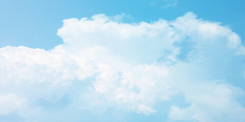 It's a hot day with the sun shining down on a blue sky filled with alternating small and huge clouds moving gently while the light from the sky creates a remarkable abstract shape. Horizon, Cloud Back