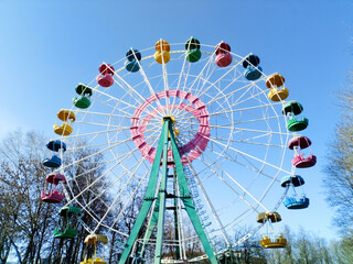 Ferris wheel. Amusement Park. Entertainment. Holidays. - obrazy, fototapety, plakaty